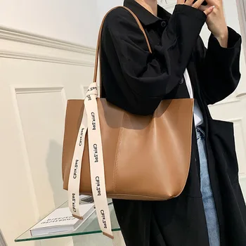 Retro faktūru soma sieviešu 2022. gada rudenī jaunā modes lenti plecu tote soma braukā lielas ietilpības puses retro faktūru soma sievietēm
